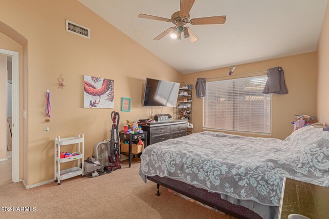 carpeted bedroom featuring ceiling fan and lofted ceiling