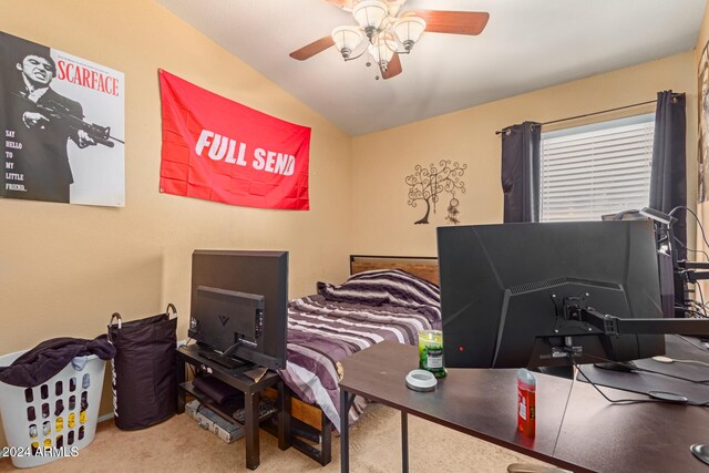 bedroom featuring carpet floors, vaulted ceiling, and ceiling fan