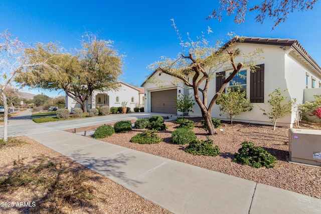 view of front of home with a garage