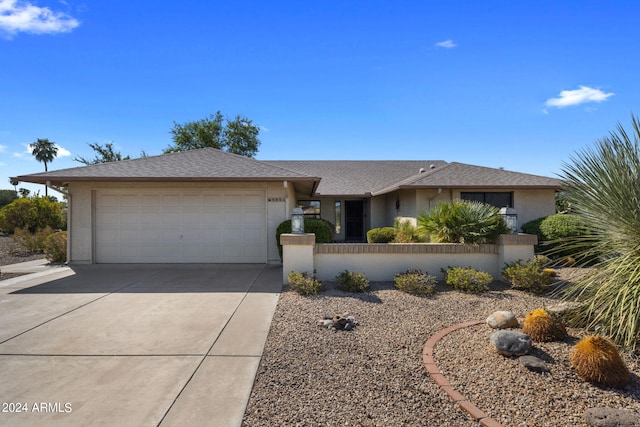 single story home with a garage