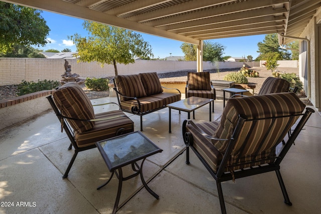 view of patio / terrace featuring a fenced backyard and an outdoor hangout area