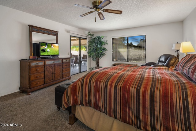 carpeted bedroom with access to exterior, a textured ceiling, and ceiling fan