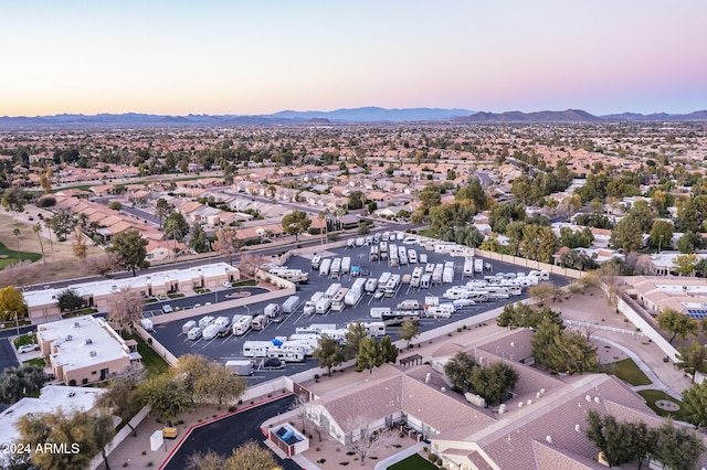 aerial view at dusk with a mountain view