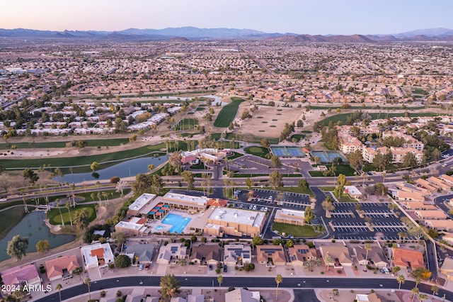 bird's eye view with a water and mountain view