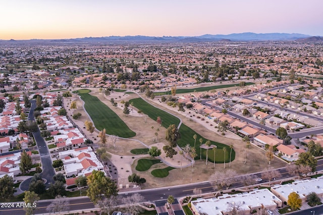 bird's eye view featuring a mountain view, golf course view, and a residential view