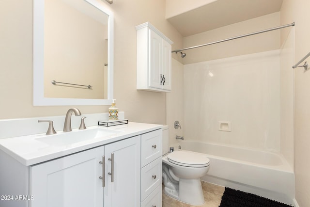 bathroom featuring toilet, tub / shower combination, vanity, and tile patterned flooring