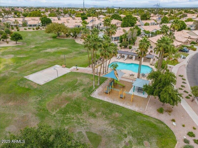 aerial view of residential area featuring a pool