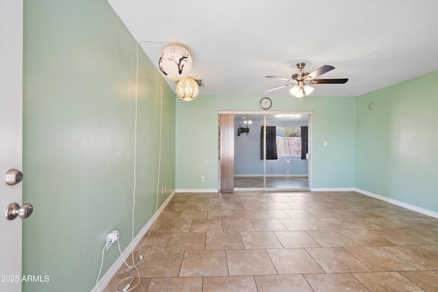 unfurnished room featuring ceiling fan