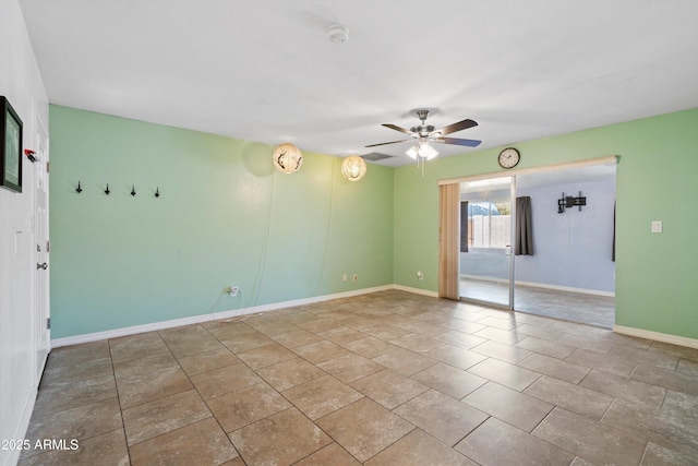 unfurnished room with ceiling fan