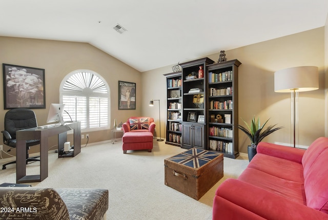 living room featuring carpet floors and vaulted ceiling