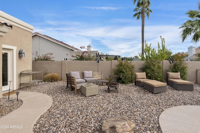 view of patio featuring a fire pit