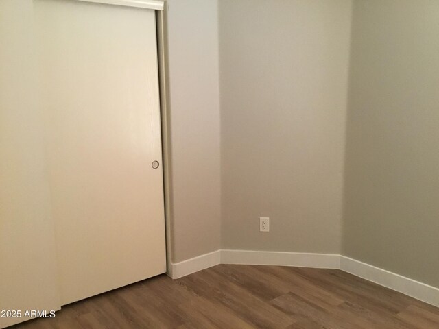 1827 E Carla Vista Dr, Gilbert, AZ 85295 - spare room featuring dark wood-style floors and baseboards