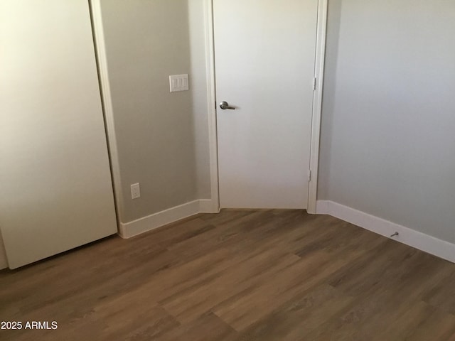 1827 E Carla Vista Dr, Gilbert, AZ 85295 - unfurnished bedroom with wood finished floors, baseboards, and a closet