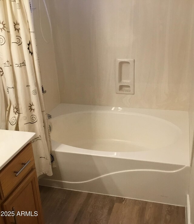 1827 E Carla Vista Dr, Gilbert, AZ 85295 - bathroom featuring wood finished floors, vanity, and shower / bath combination with curtain