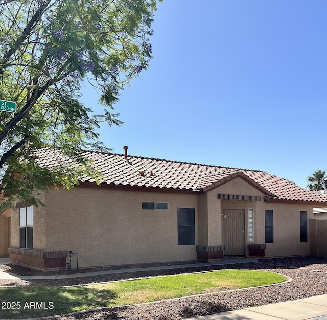 1827 E Carla Vista Dr, Gilbert, AZ 85295 - view of front of house featuring a tiled roof and stucco siding