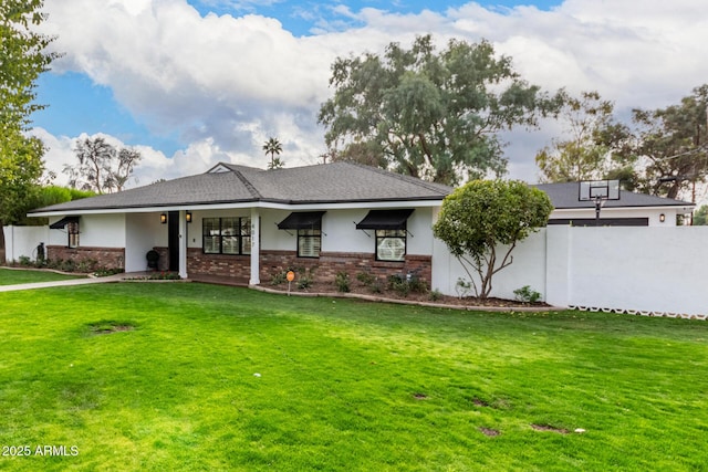 view of front of home with a front yard