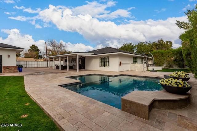 view of swimming pool with a patio