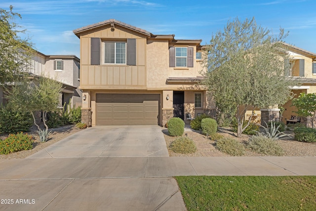 view of front of property with driveway, stucco siding, stone siding, a garage, and board and batten siding