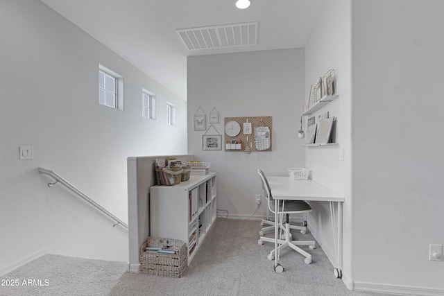 home office featuring visible vents, carpet flooring, and baseboards