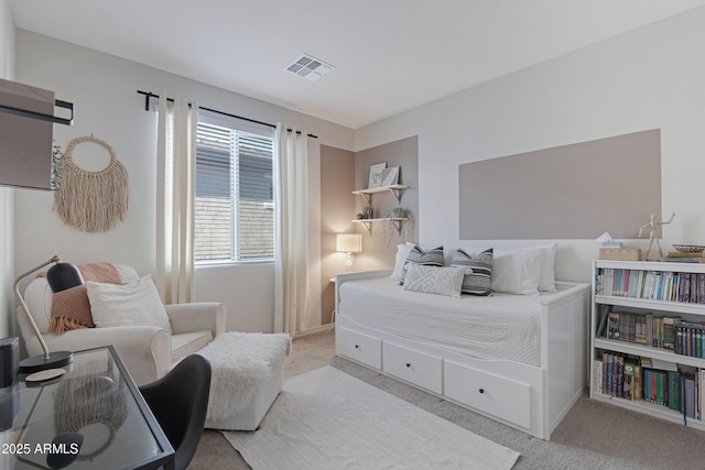 carpeted bedroom with visible vents