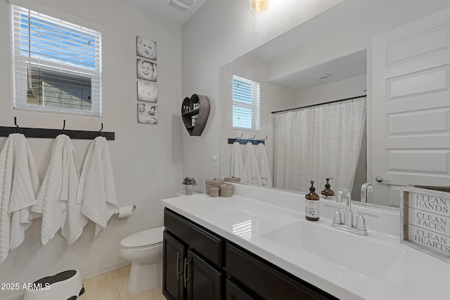 bathroom featuring vanity, visible vents, tile patterned flooring, curtained shower, and toilet