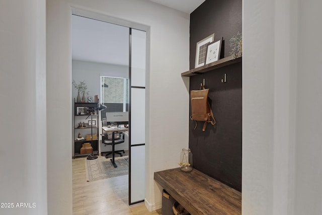 mudroom featuring light wood-style flooring