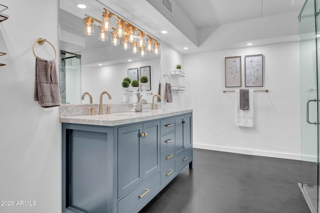 bathroom with vanity and concrete flooring