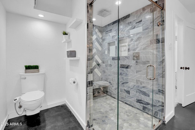 bathroom with walk in shower and toilet