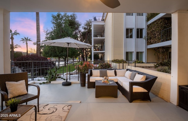 patio terrace at dusk with an outdoor hangout area