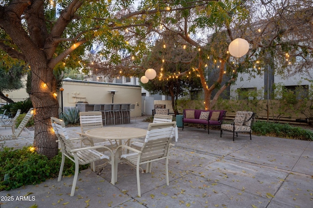 view of patio / terrace with an outdoor hangout area and an outdoor bar