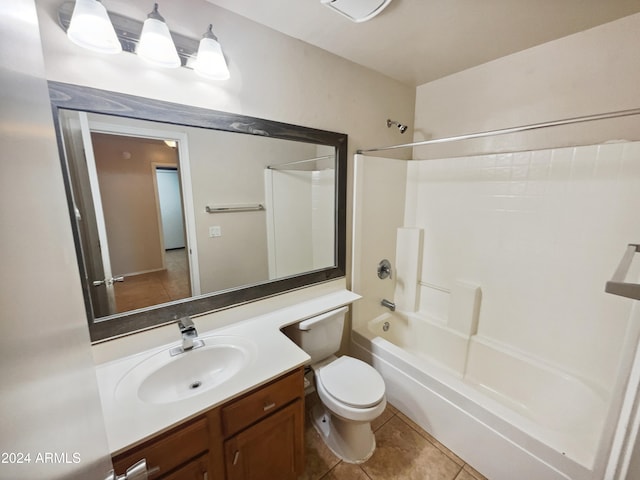 full bathroom with toilet, shower / tub combination, vanity, and tile patterned floors