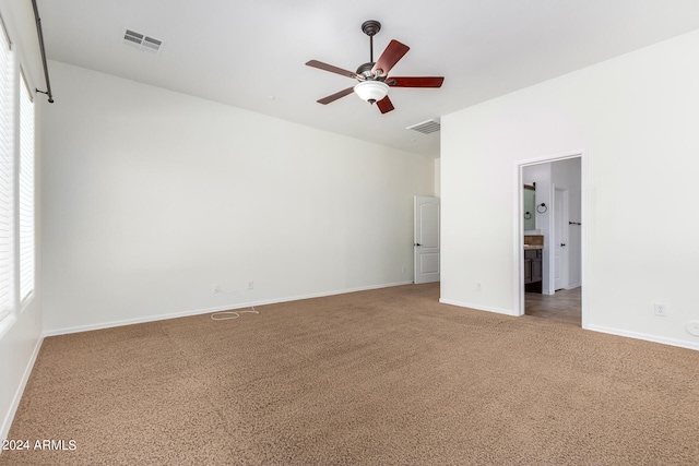 carpeted empty room with ceiling fan