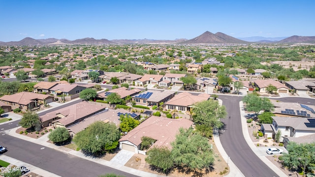 birds eye view of property featuring a mountain view