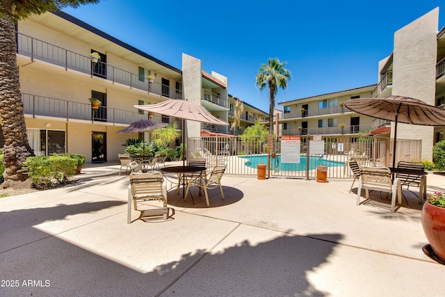 4727 E Lafayette Blvd Unit 211, Phoenix, AZ 85018 - community pool featuring a patio area