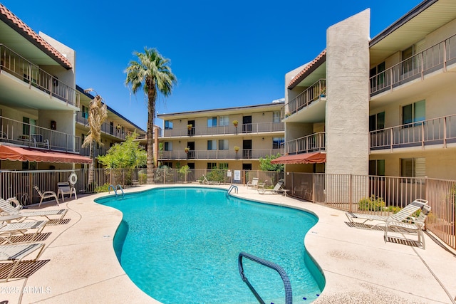 4727 E Lafayette Blvd Unit 211, Phoenix, AZ 85018 - community pool featuring a patio