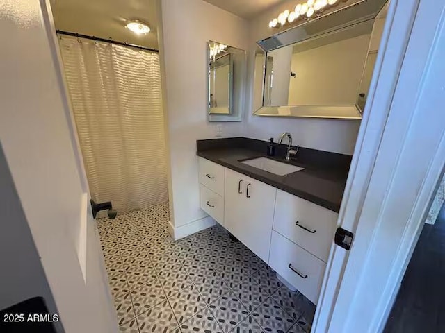 4727 E Lafayette Blvd Unit 211, Phoenix, AZ 85018 - full bath featuring vanity and curtained shower
