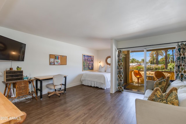 4727 E Lafayette Blvd Unit 211, Phoenix, AZ 85018 - bedroom with access to exterior, wood finished floors, and baseboards