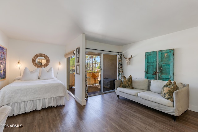 4727 E Lafayette Blvd Unit 211, Phoenix, AZ 85018 - bedroom with access to exterior, wood finished floors, and baseboards