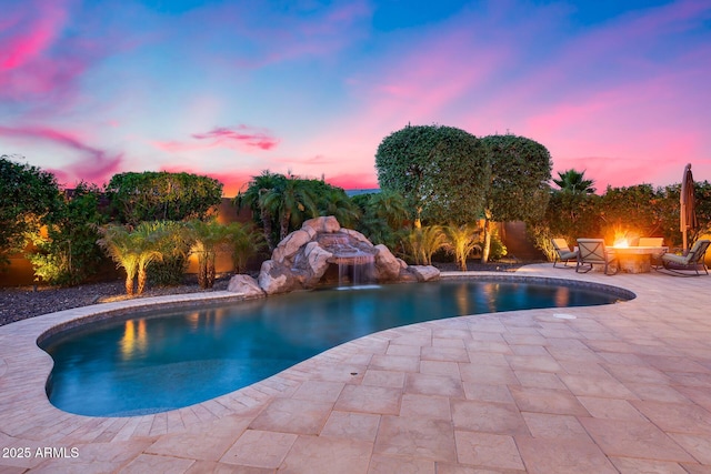 19414 W Pasadena Ave, Litchfield Park, AZ 85340 - view of pool featuring a fire pit and a patio