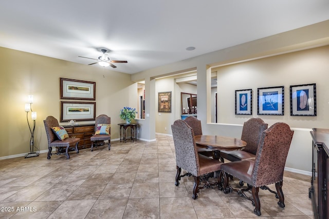 19414 W Pasadena Ave, Litchfield Park, AZ 85340 - dining area featuring a ceiling fan, light tile patterned floors, and baseboards