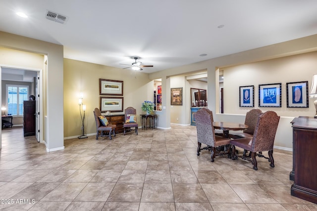 19414 W Pasadena Ave, Litchfield Park, AZ 85340 - dining space featuring a ceiling fan, light tile patterned floors, and baseboards