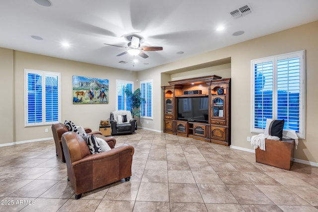 19414 W Pasadena Ave, Litchfield Park, AZ 85340 - living area featuring ceiling fan, tile patterned flooring, plenty of natural light, and recessed lighting