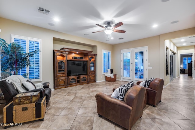 19414 W Pasadena Ave, Litchfield Park, AZ 85340 - living room featuring light tile patterned floors, ceiling fan, recessed lighting, and baseboards
