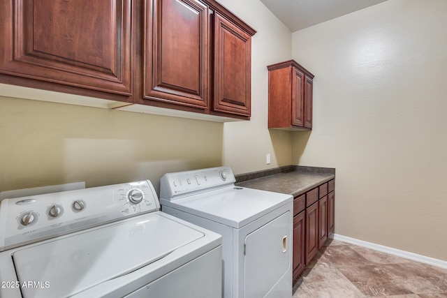 19414 W Pasadena Ave, Litchfield Park, AZ 85340 - clothes washing area with washing machine and clothes dryer, cabinet space, and baseboards