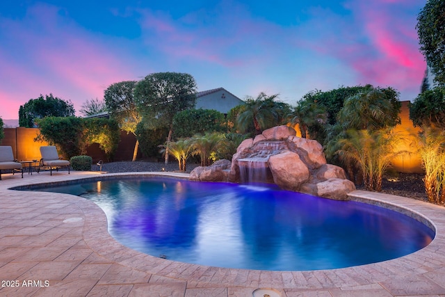 19414 W Pasadena Ave, Litchfield Park, AZ 85340 - view of swimming pool featuring a patio area and fence