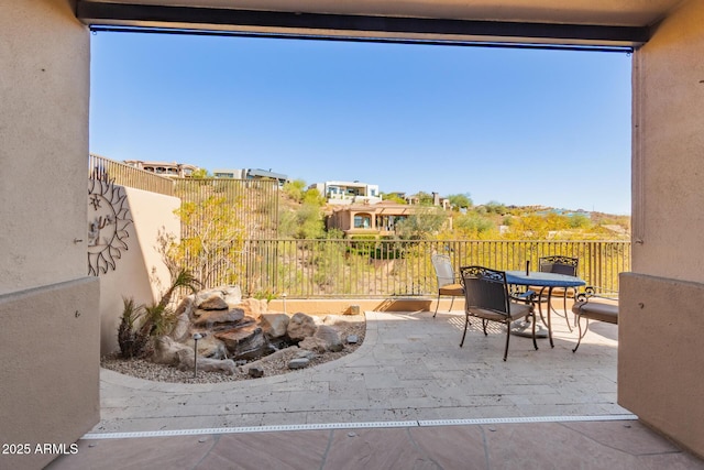 balcony featuring a patio and outdoor dining space