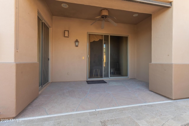 view of patio / terrace with ceiling fan