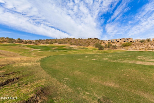 view of home's community featuring golf course view