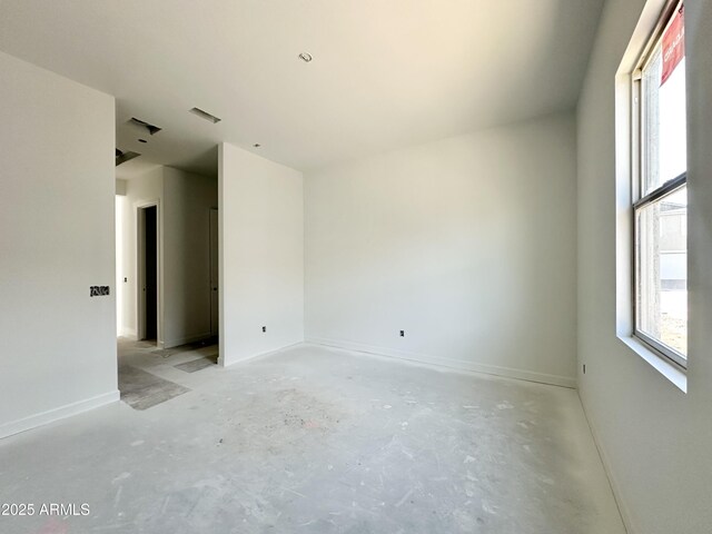 spare room with a wealth of natural light