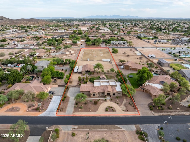 6861 W Calle Lejos, Peoria, AZ 85383 - aerial perspective of suburban area with property boundaries highlighted and a mountainous background